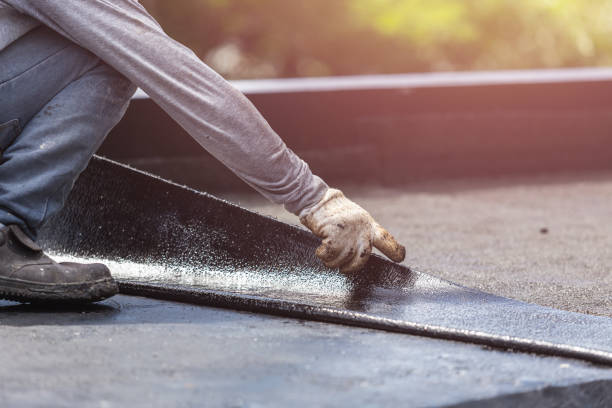 Professional Waterproofing technician working in Montgomery Village, MD